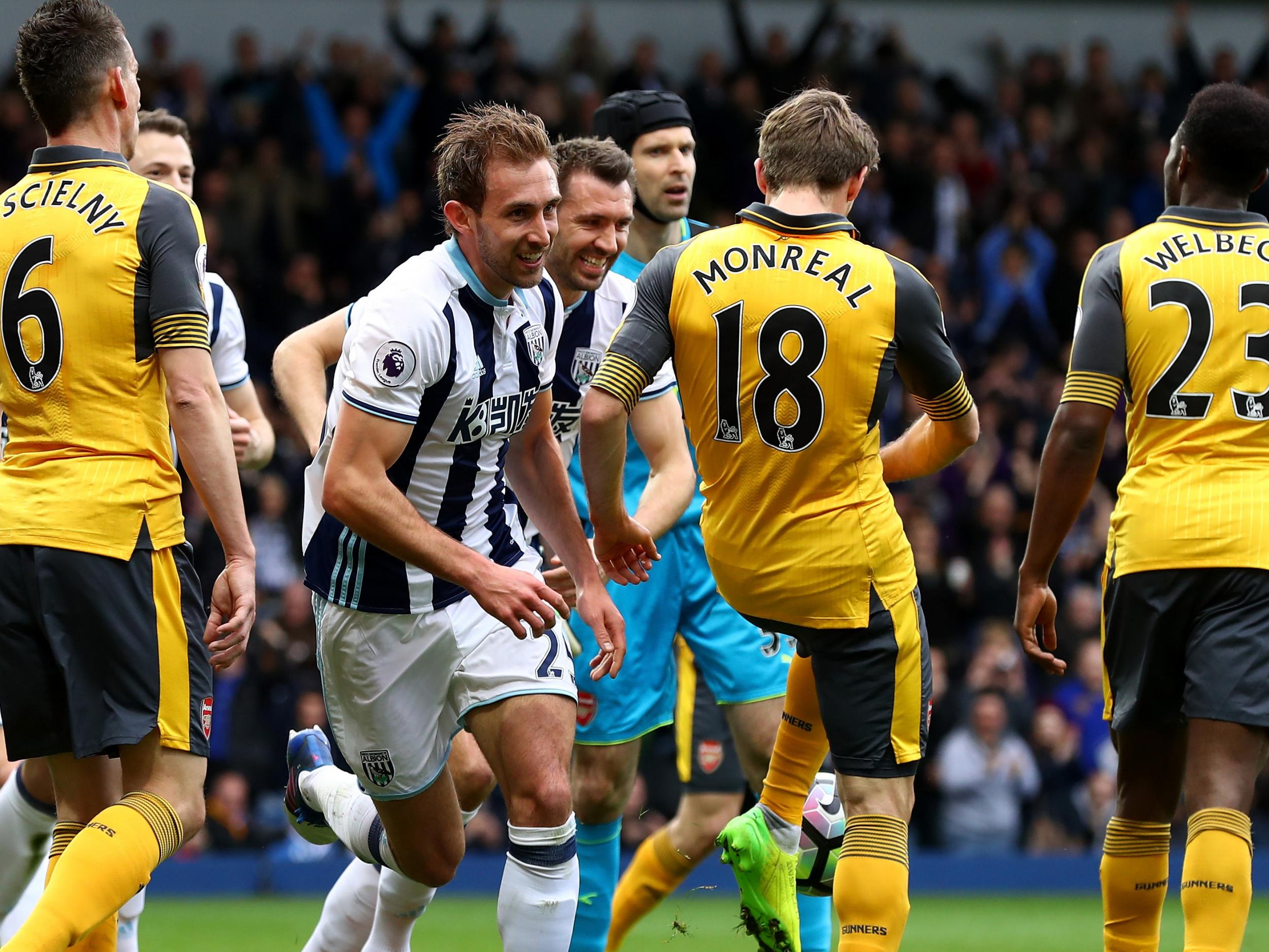 Craig Dawson celebrates scoring against Arsenal