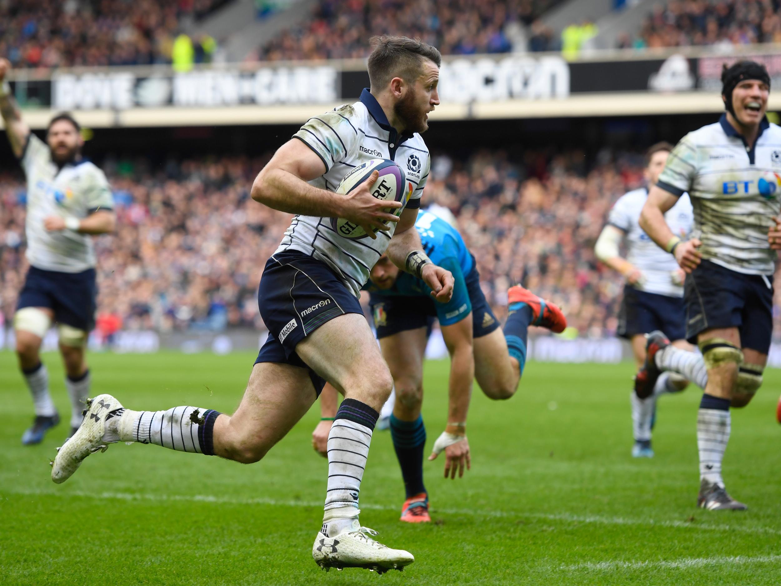 Tommy Seymour runs in for Scotland's fourth try