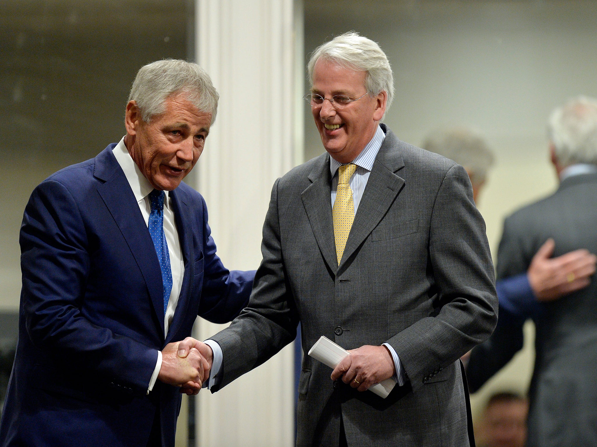 Ivo Daalder (R) with then US Secretary of Defense Chuck Hagel in Chicago in 2014