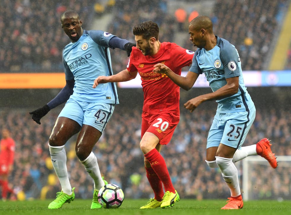 Adam Lallana glides past Yaya Toure and Fernandinho in the opening stages
