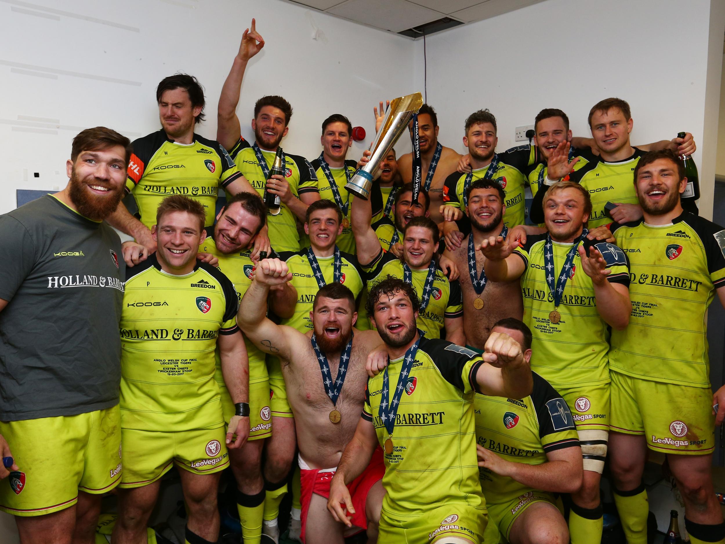 Leicester players celebrate in the changing rooms