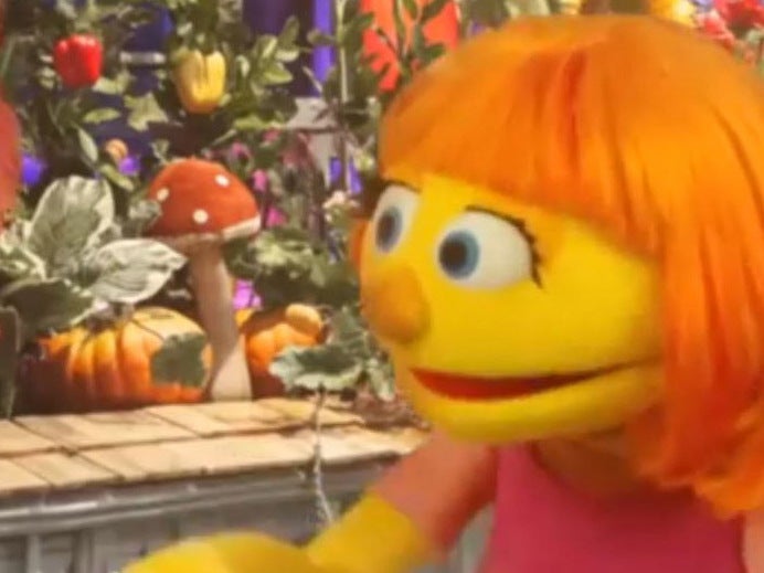 Sesame Street’s newest character Julia (right) has autism and was created with diversity and inclusion in mind
