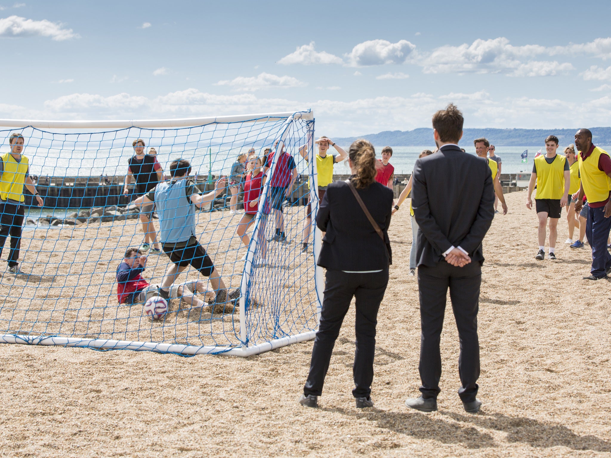 DI Hardy (David Tennant) and DS Miller (Olivia Colman) watch the community football match that featured a large number of potential suspects