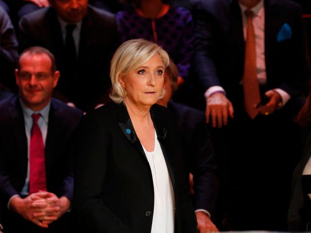 Le Pen and Macron clash over immigration and burkini policy