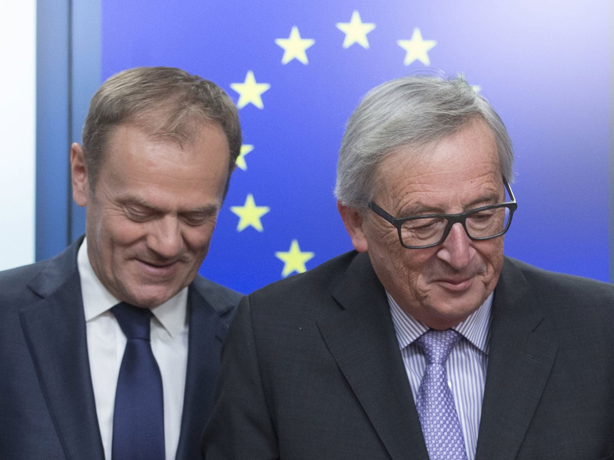 EU Commission President Jean-Claude Juncker (R) and European Council President Donald Tusk, speaking in Brussels, announce an EU Summit on Brexit will take place on 29 April