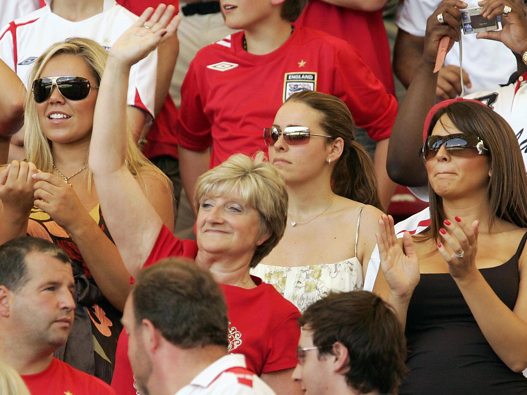 Rebecca (C) watching Ferdinand play at the 2006 World Cup