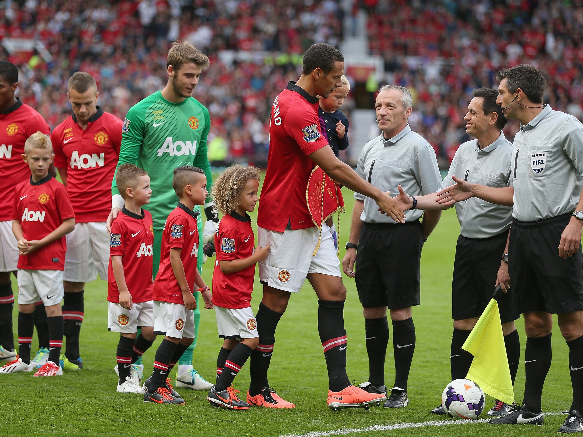 The defender with his three children at his testimonial match