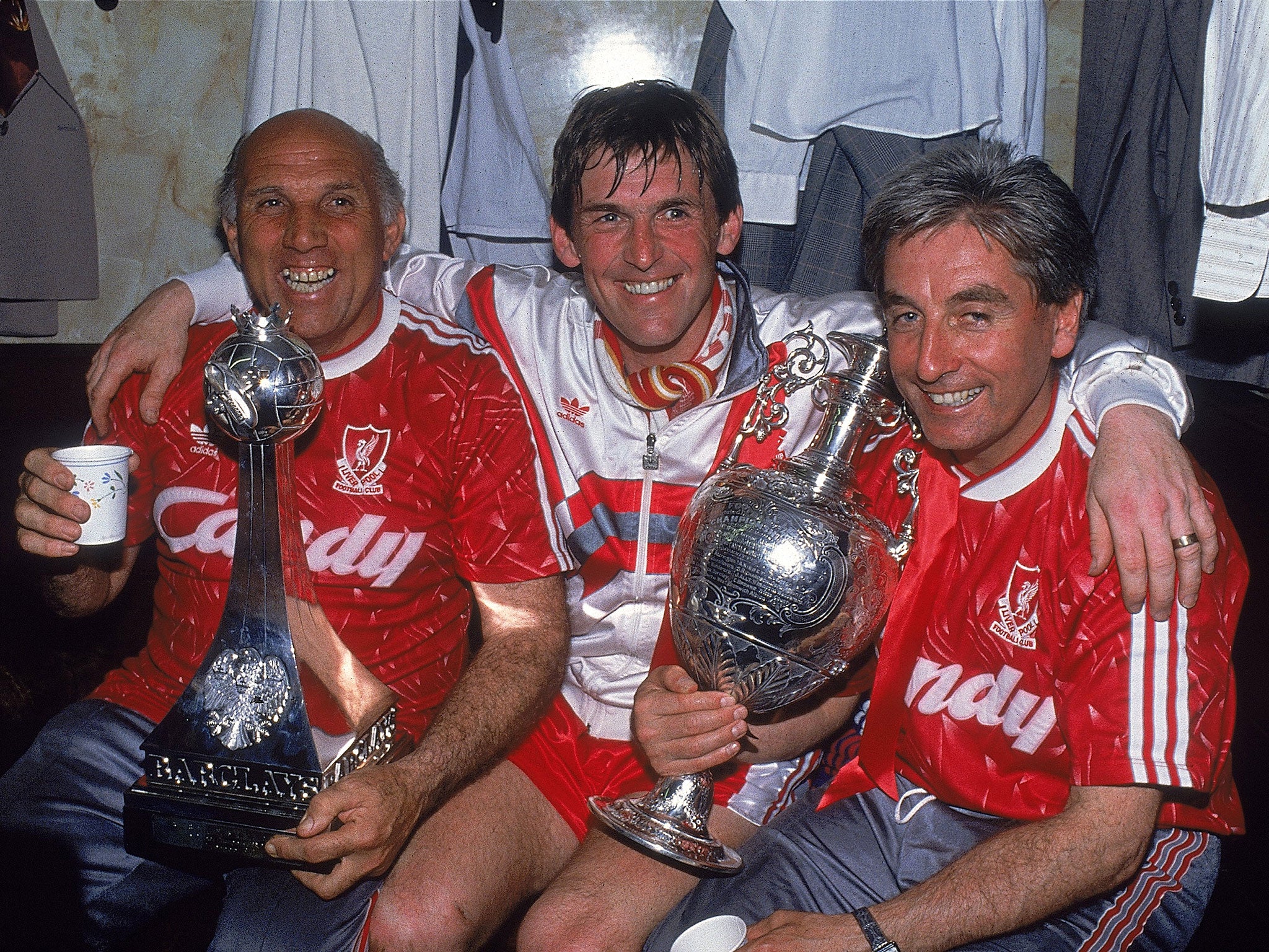 Moran (left) and Roy Evans (right) with Liverpool manager Kenny Dalglish in 1990