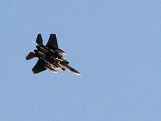US-led air strike kills 33 near Raqqa, Syrian Observatory says