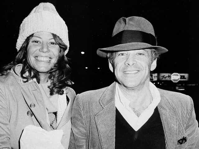 Chuck Barris and wife Robin Altman pictured leaving the Pierre Hotel in New York in 1980
