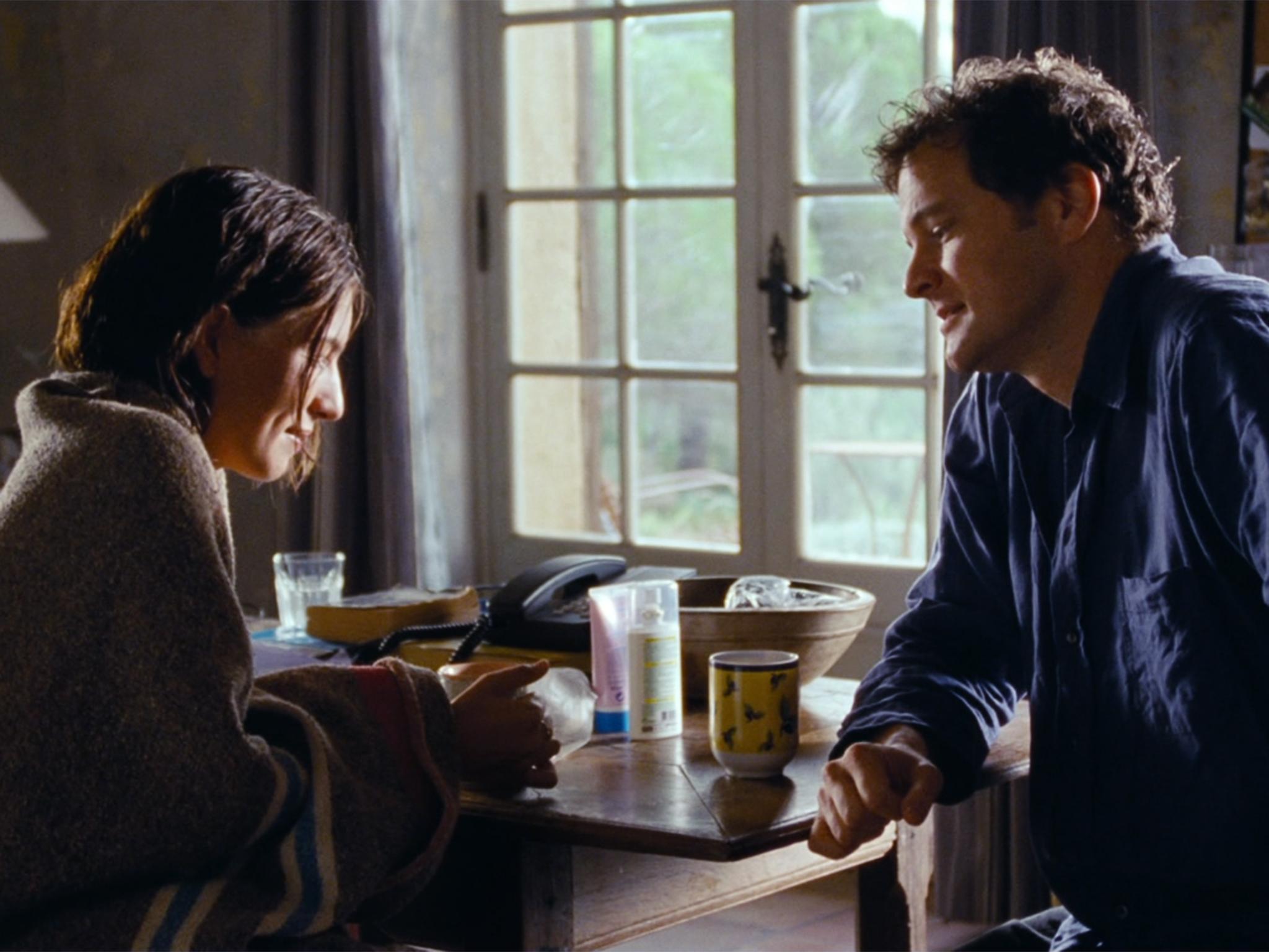 Colin Firth as novelist Jamie and his Portuguese housekeeper Aurelia (Lucia Moniz) who speaks no English
