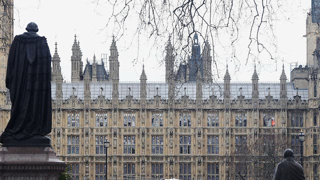 An air ambulance lands after gunfire sounds were heard close to the Palace of Westminster in London