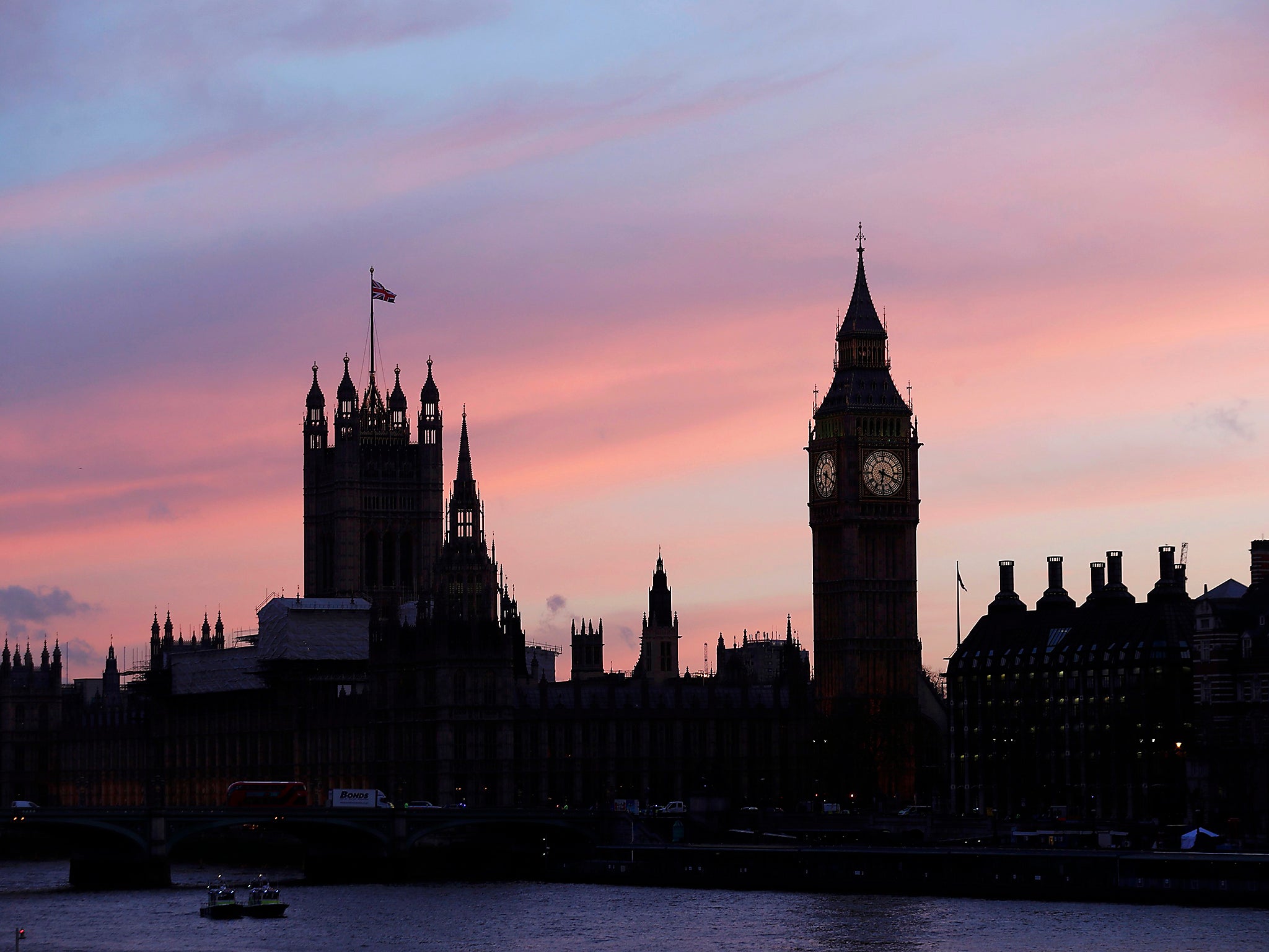 The sun sets behind the Houses of Parliament after an attack on Westminster Bridge in London