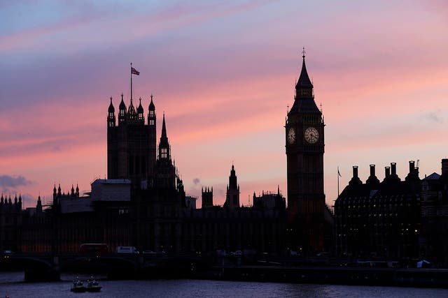 The sun sets behind the Houses of Parliament after an attack on Westminster Bridge in London