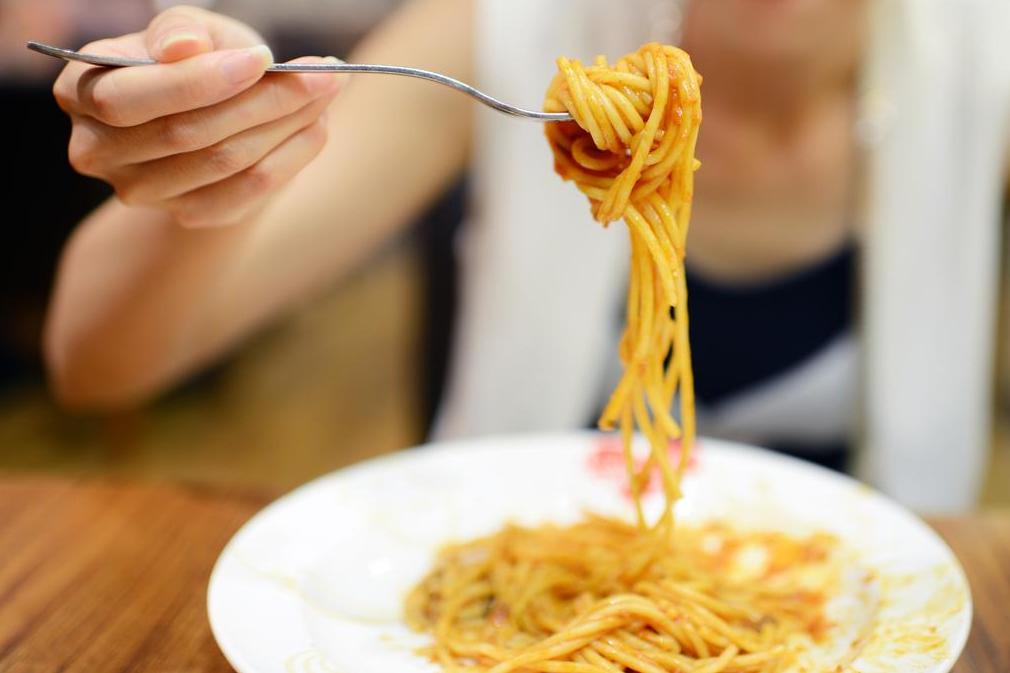 Many people think that eating carbs, like spaghetti, in the evening is bad for you. But are they right?