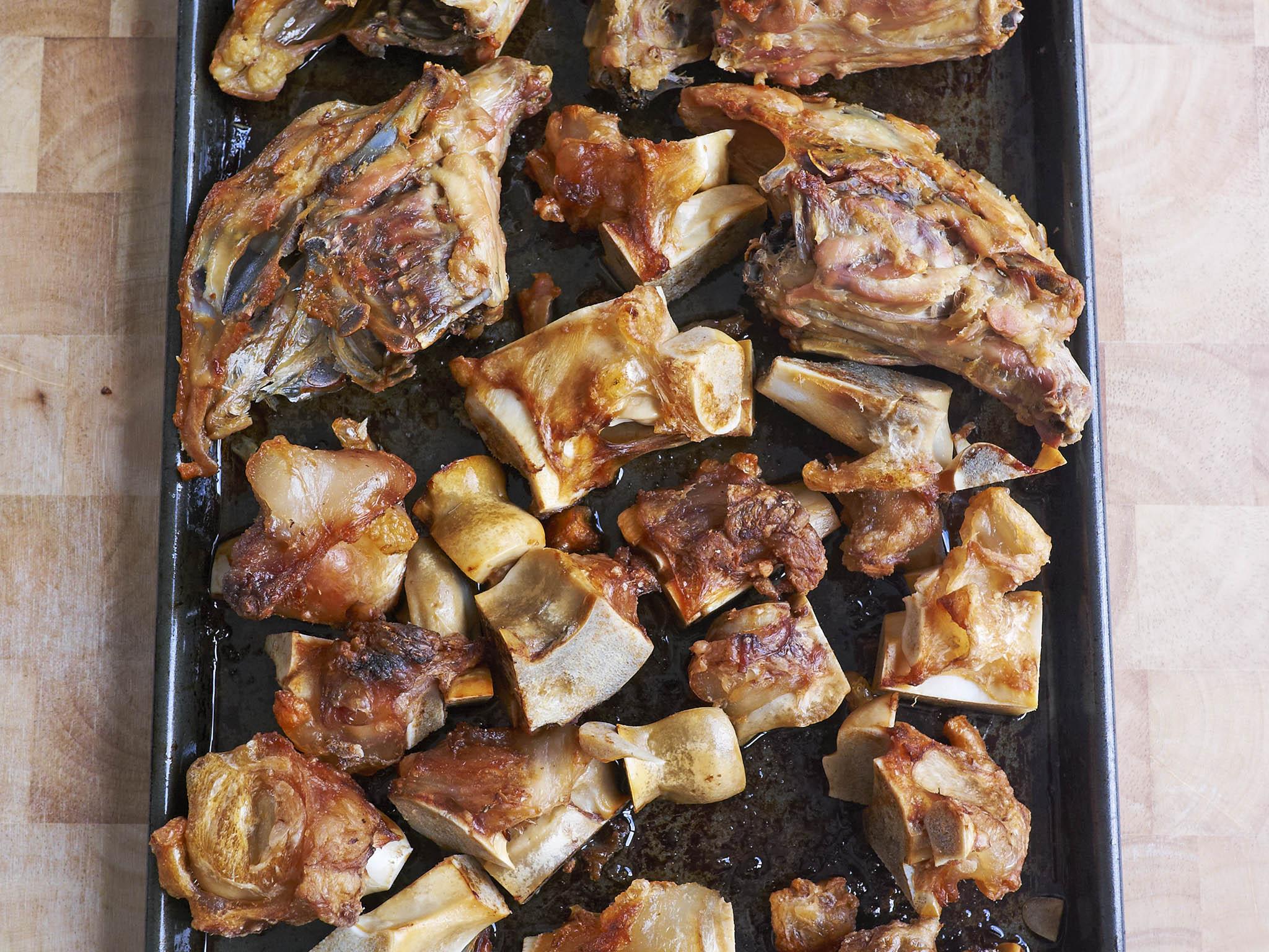 2. The browned chicken and veal bones, ready for the stockpot