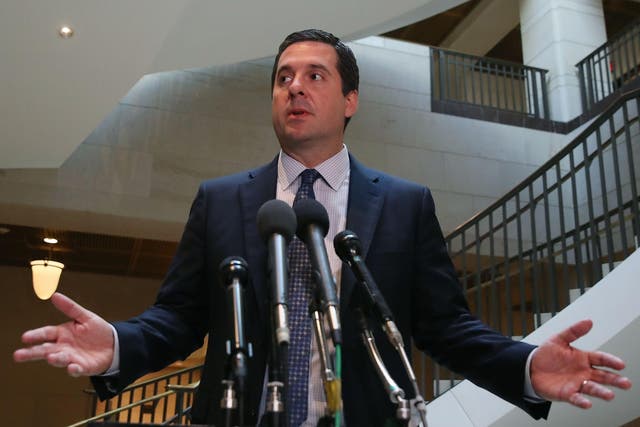 Devin Nunes talks to reporters after leaving a closed meeting with House Intelligence Committee