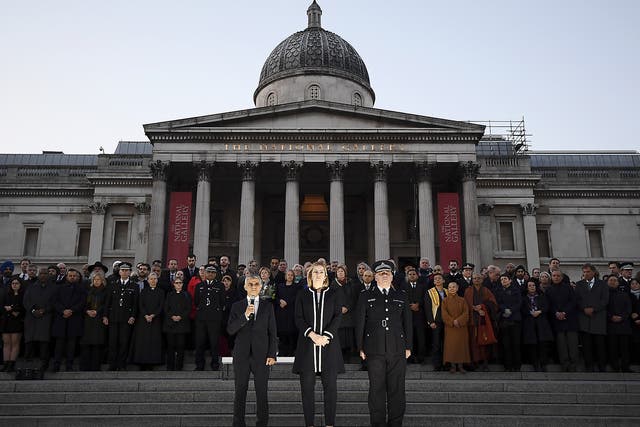 Sadiq Khan, Amber Rudd and Craig Mackey speak at a candlelit vigil in Trafalgar Square