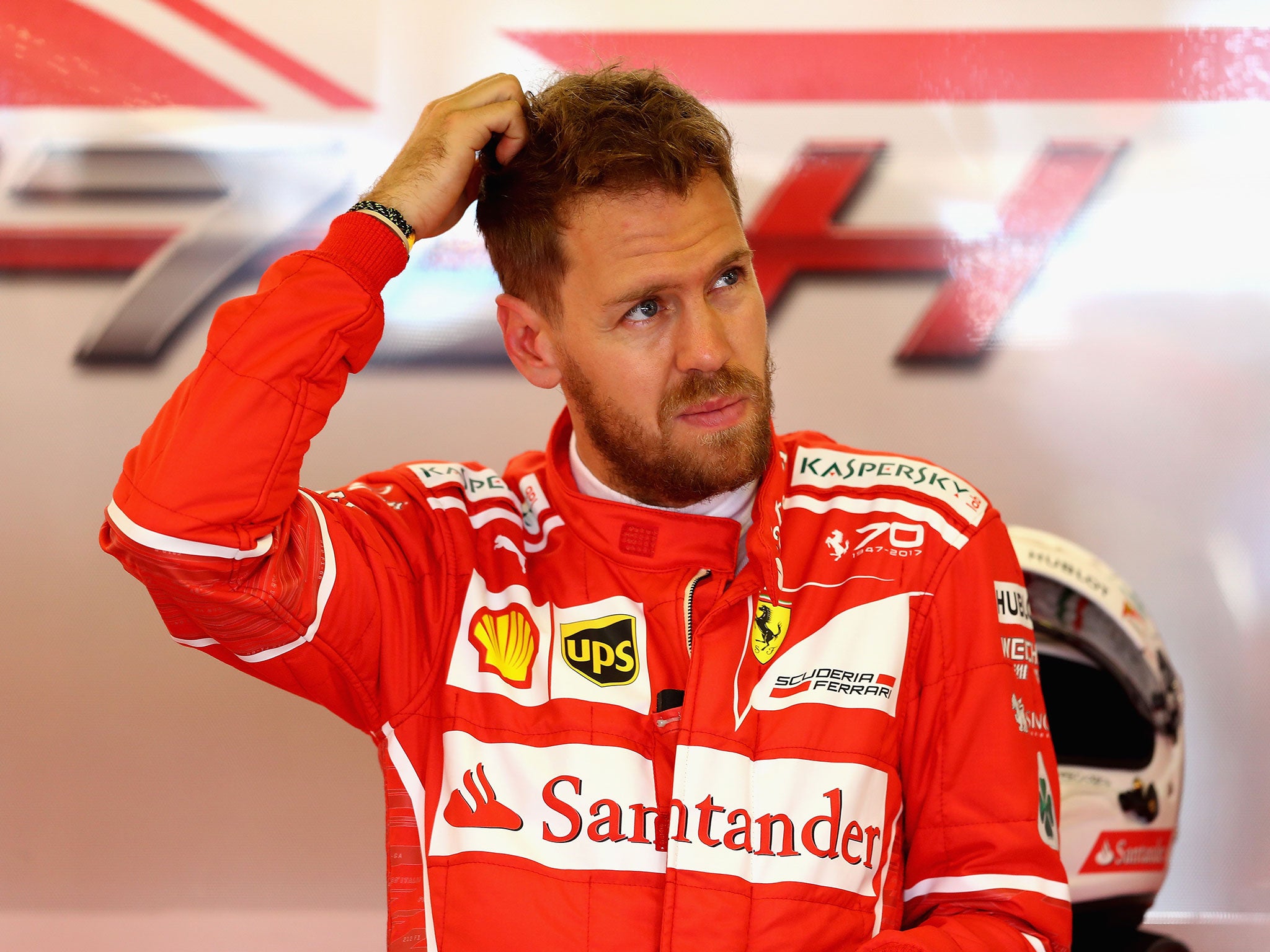 Vettel appeared puzzled by the gap to the lead Mercedes