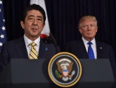 Donald Trump 'obsessed with translator's breasts' on Shinzo Abe visit