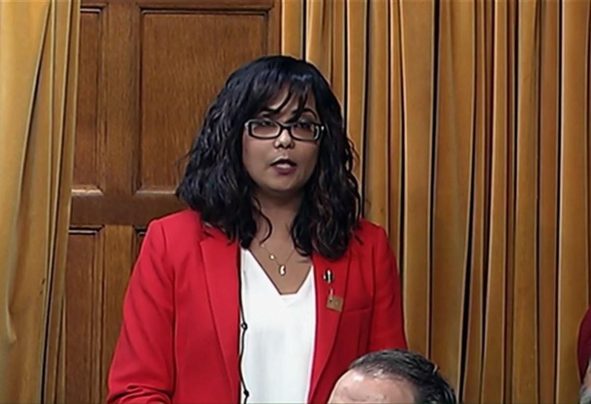 Liberal MP Irqa Khalid, who tabled the motion, was cheered loudly by her party as the vote passed
