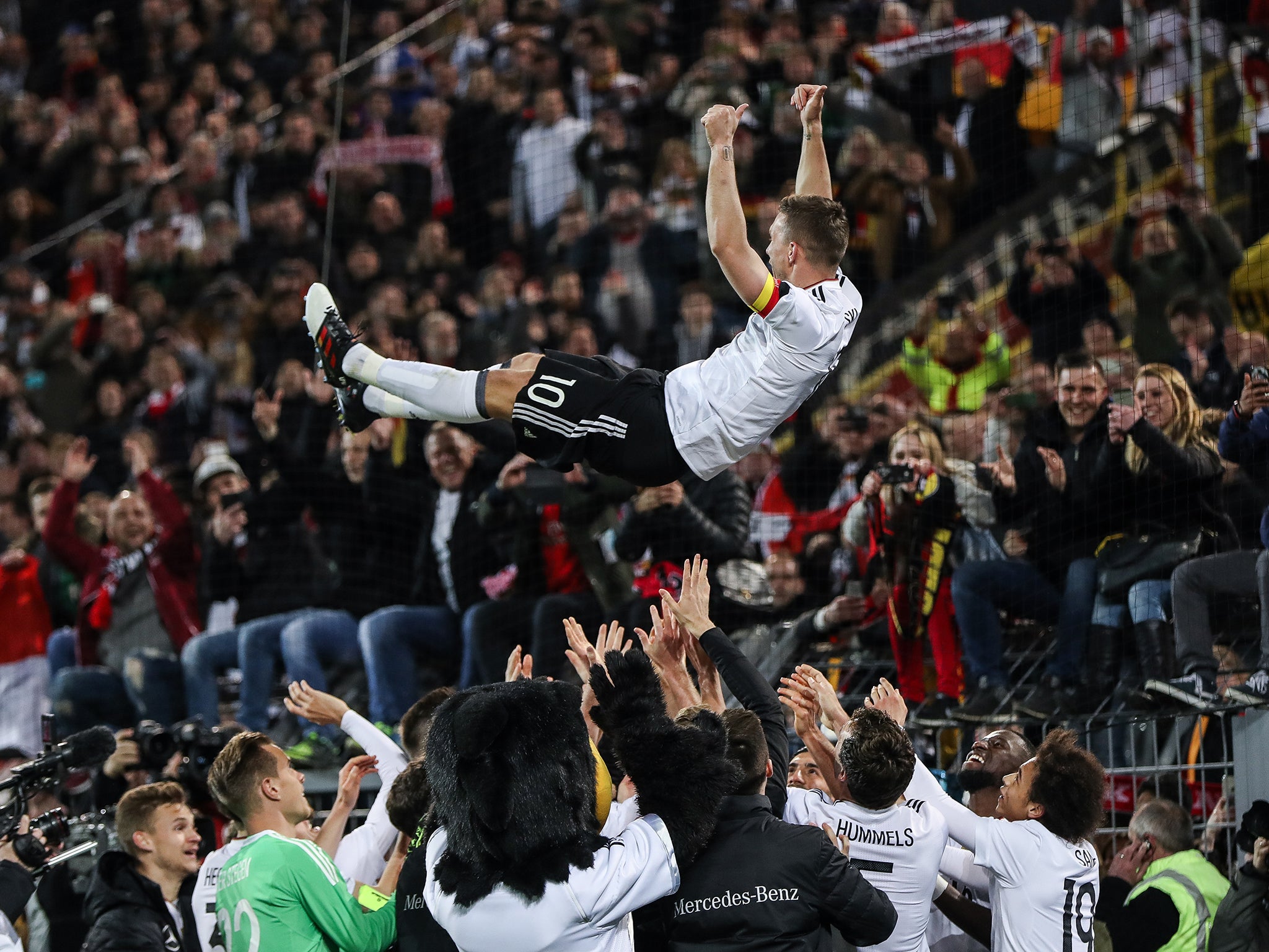 Podolski was given a rapturous send off at the Westfalenstadion (Bongarts/Getty )