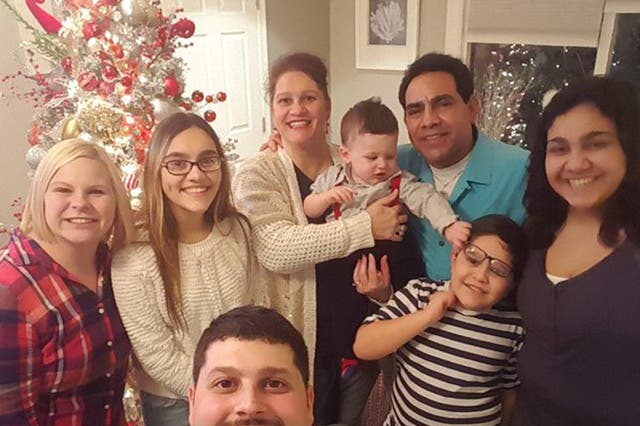 Roberto Beristain, third from right, was due to be deported on Friday