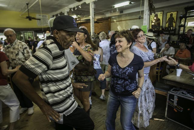 The weekend starts early in Cajun Country, with dancing from 8am at the Cafe des Amis
