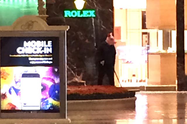 An armed robber in a pig mask at the Bellagio hotel and casino in Las Vegas on 25 March