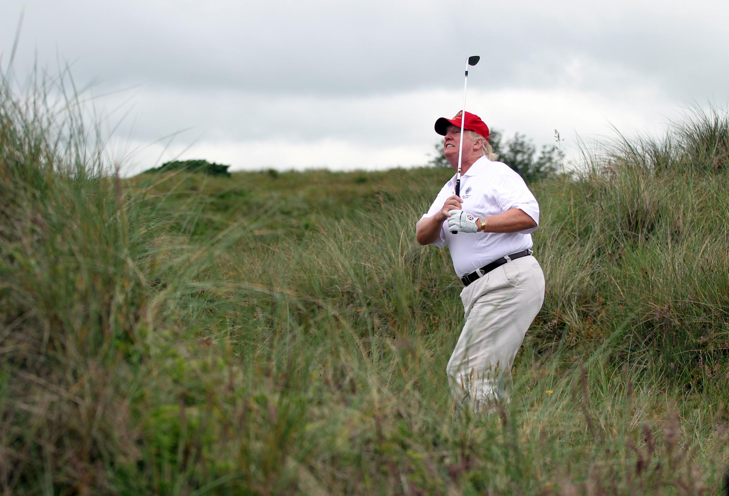 Mr Trump playing golf in Balmedie, Scotland