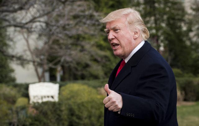 President Donald Trump walks to the White House on March 19, 2017 in Washington, DC.