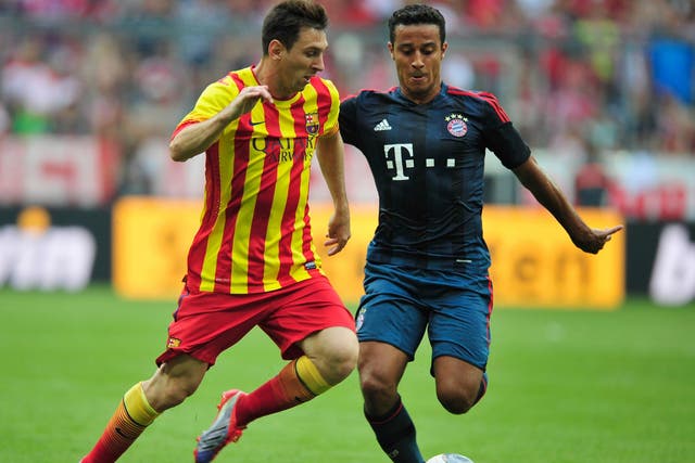 Thiago in action against his former team, Barcelona