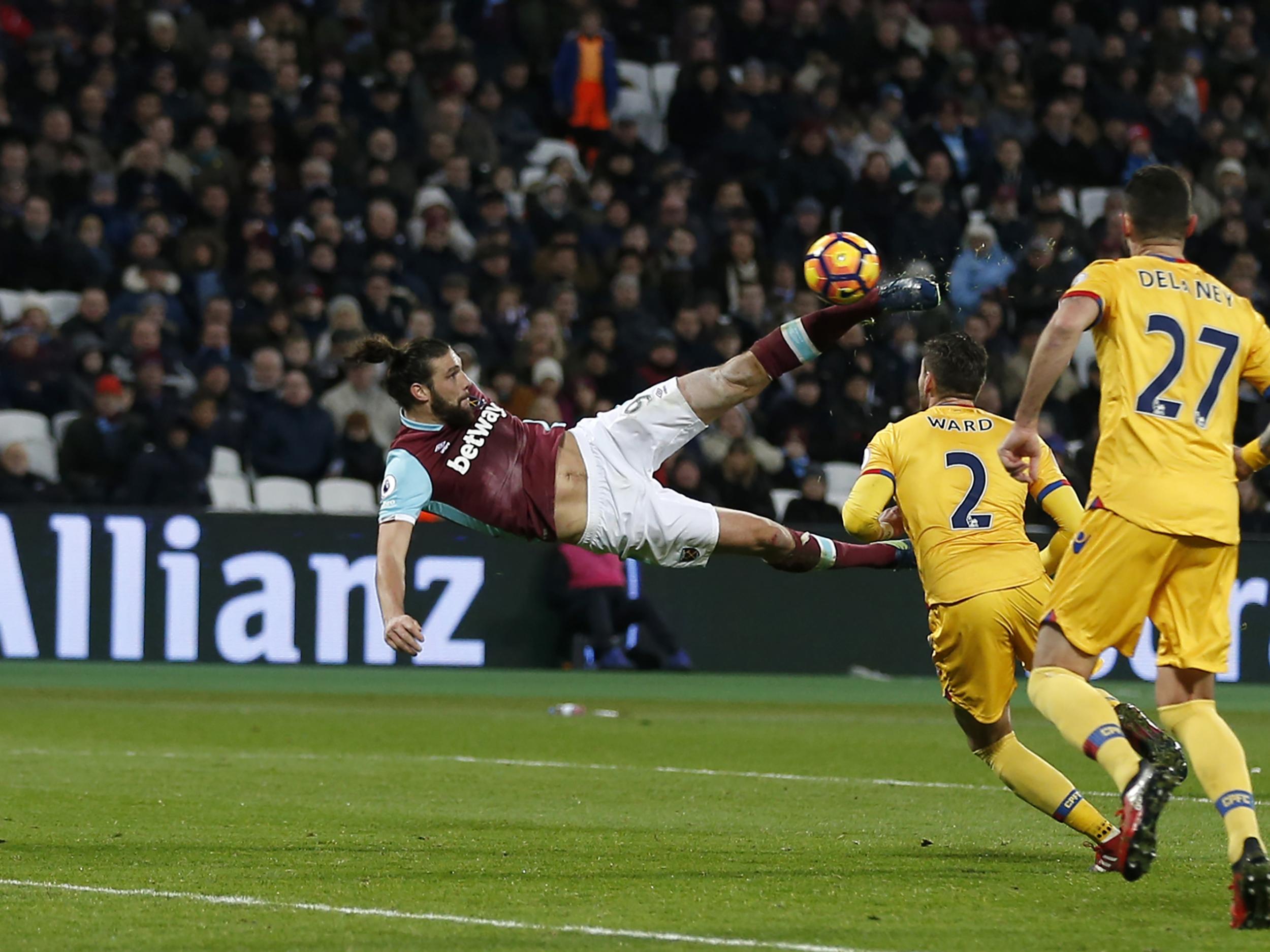 Carroll's scissor kick beat Giroud's volley to the gong