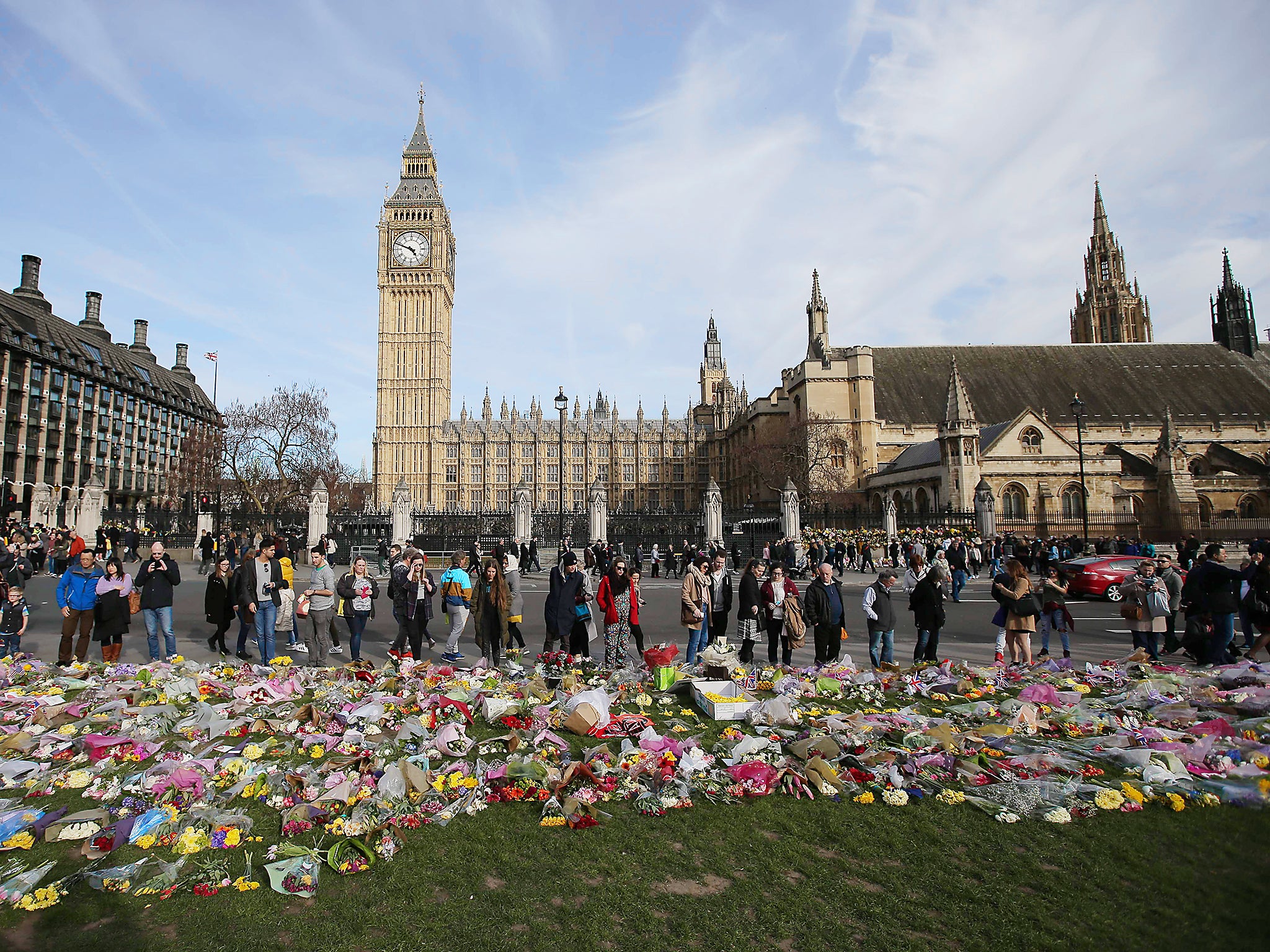 Floral tributes to the victims of the Westminster terror attack are seen in Parliament Square in central London