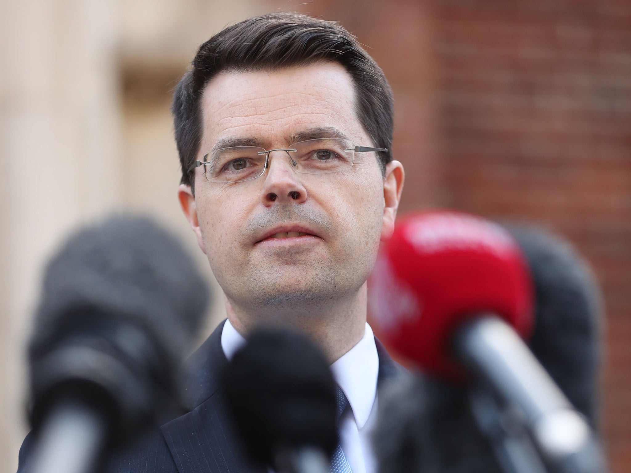 James Brokenshire makes a statement outside his office at Stormont House