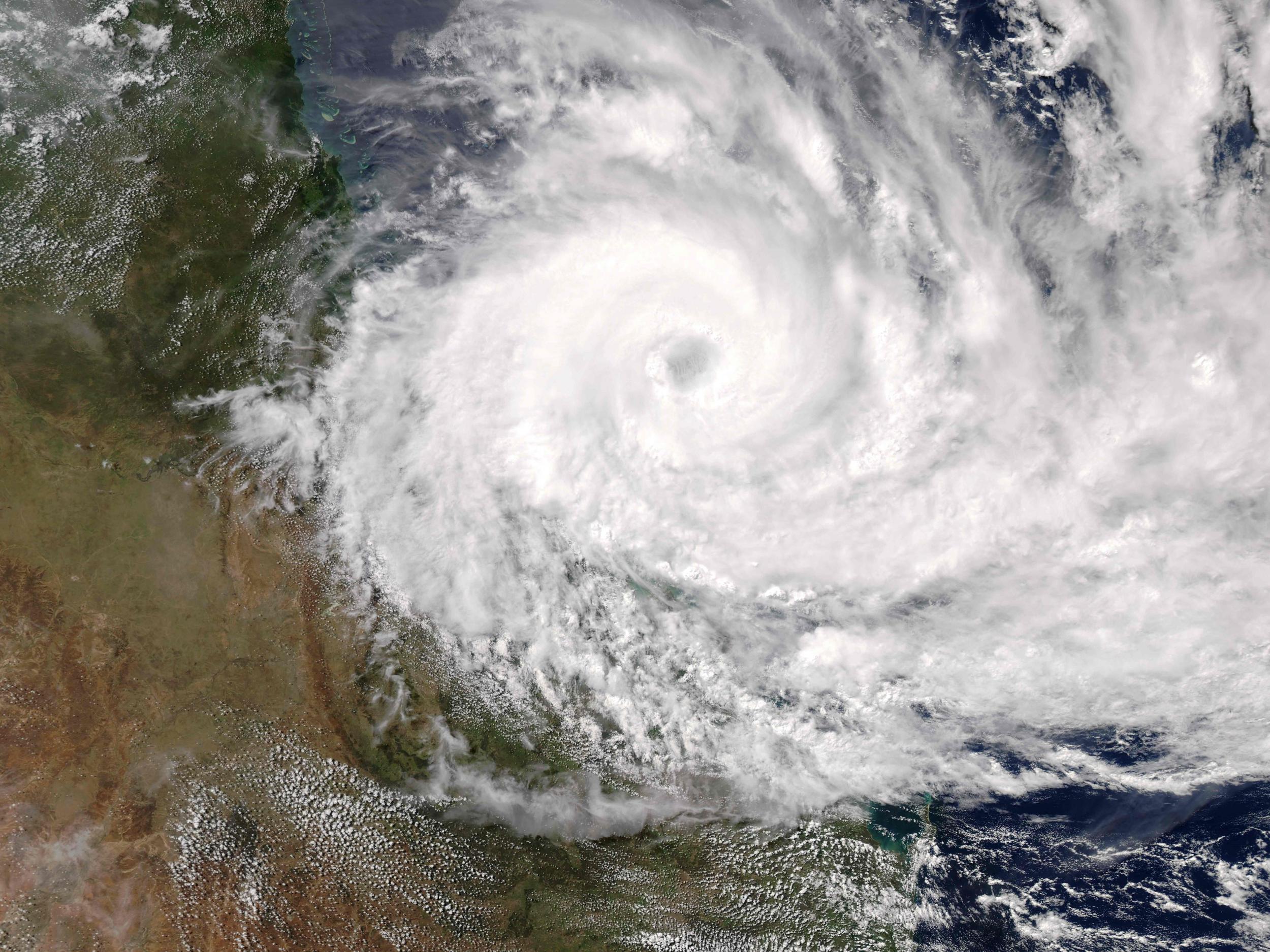 Photo shows a natural colour image captured by the Moderate Resolution Imaging Spectroradiometer on NASA's Aqua satellite of Cyclone Debbie approaching the coast of Queensland
