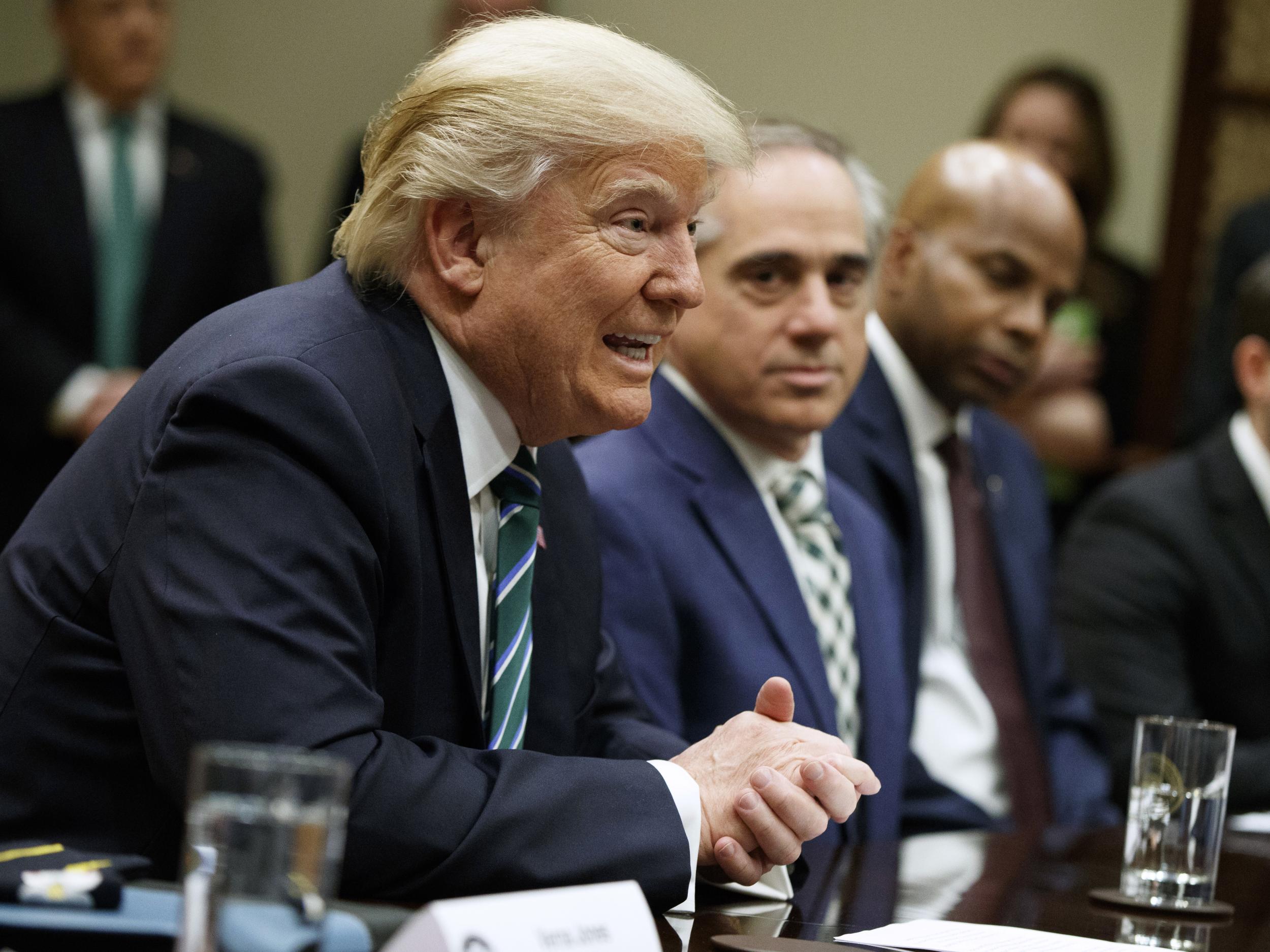 President Donald Trump speaks during a meeting about veterans affairs in the Roosevelt Room of the White House