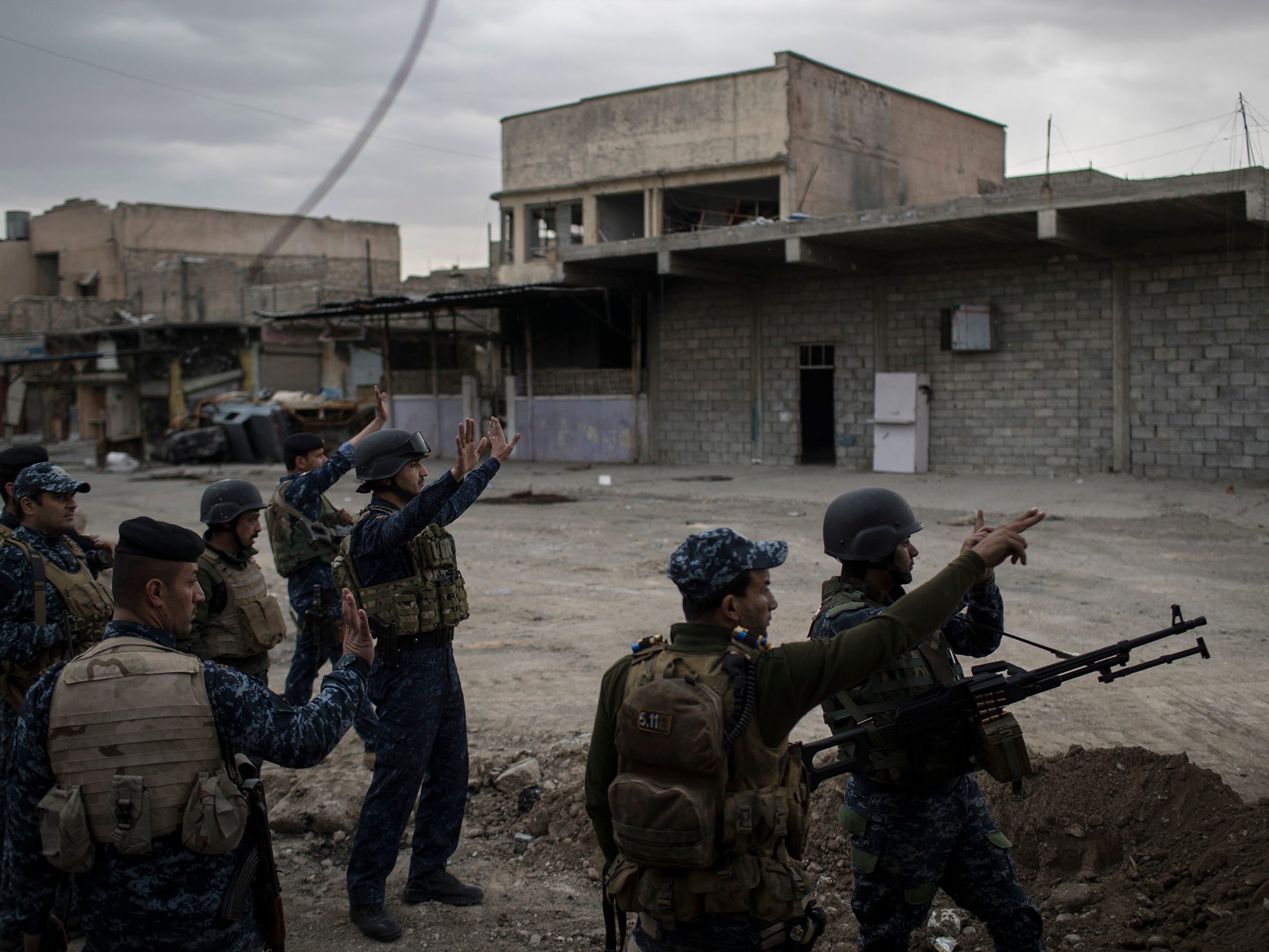 Federal Police soldiers fight against Isis in west Mosul