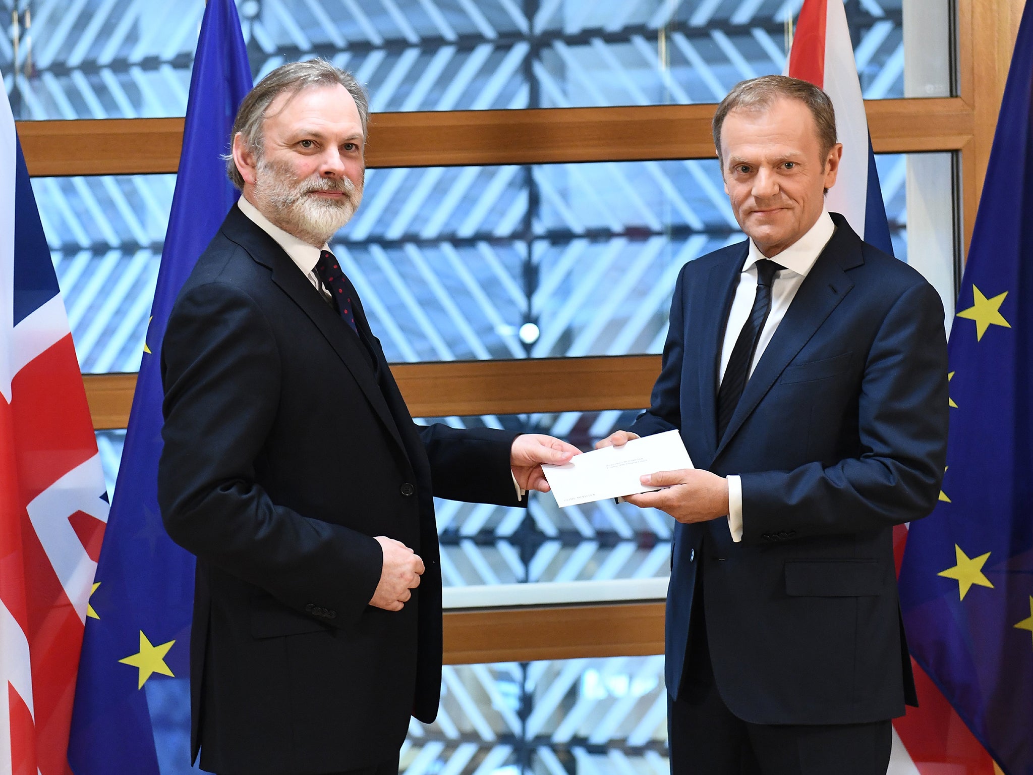 British ambassador to the EU, Sir Tim Barrow delivers the official notice under Article 50 of the Lisbon Treaty to European Council President Donald Tusk in Brussels, Belgium