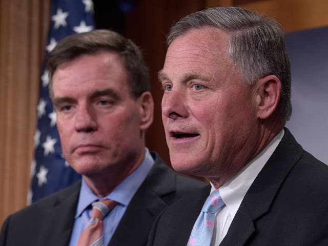 Senate Intelligence Committee Chairman Sen. Richard Burr, right, and the committee's Vice Chairman Sen. Mark Warner,  meet with reporters on Capitol Hill