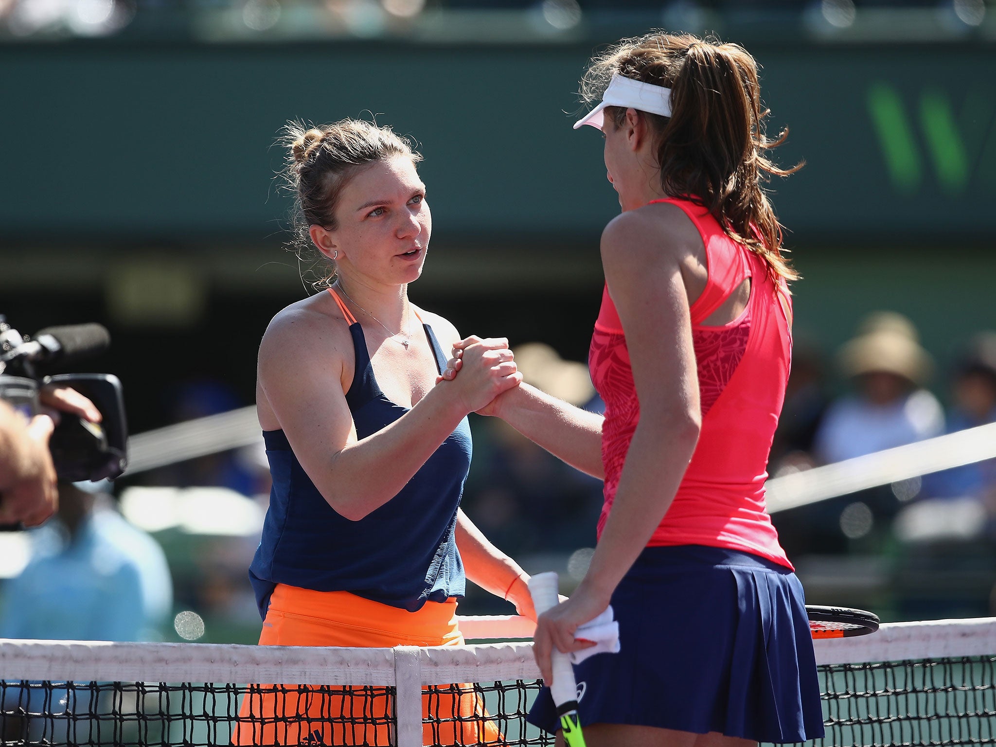 &#13;
Konta fought back after Halep served for the match in Miami &#13;