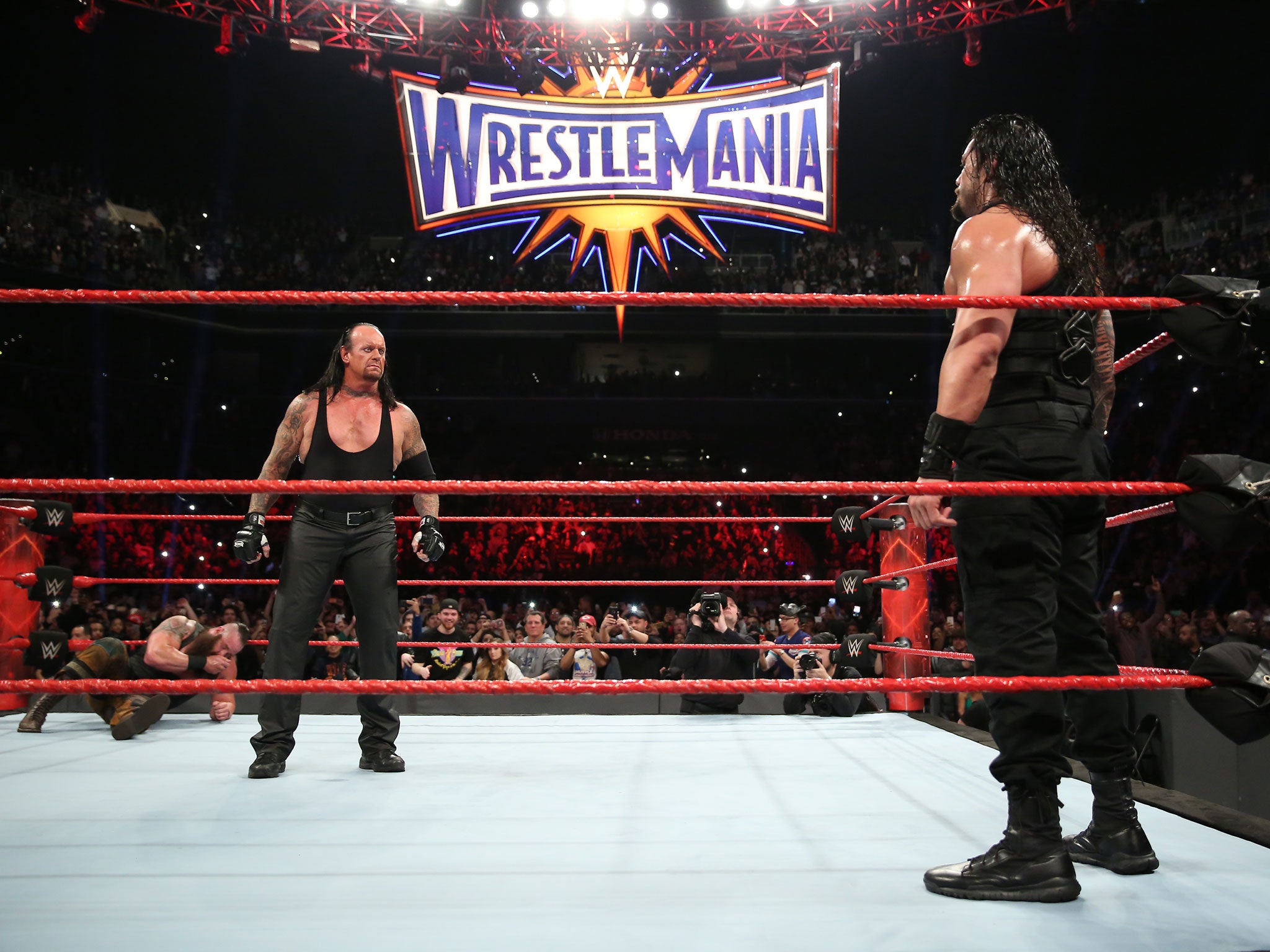 The Undertaker takes on Roman Reigns at WrestleMania