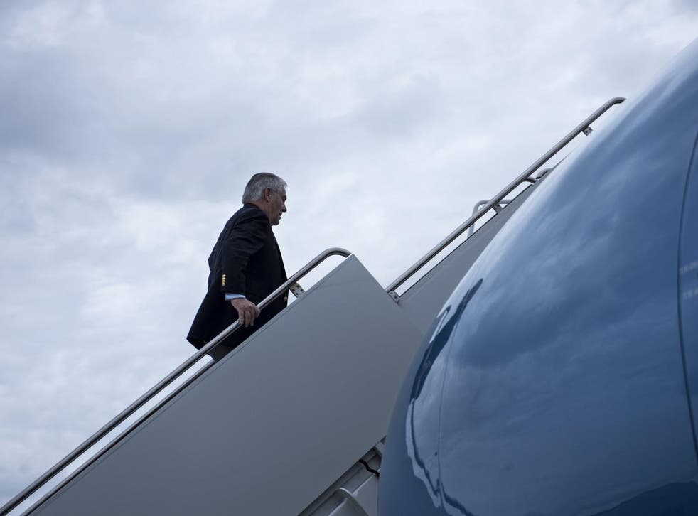 Rex Tillerson boards a plane for his first trip as Secretary of State, a visit to Germany, in February