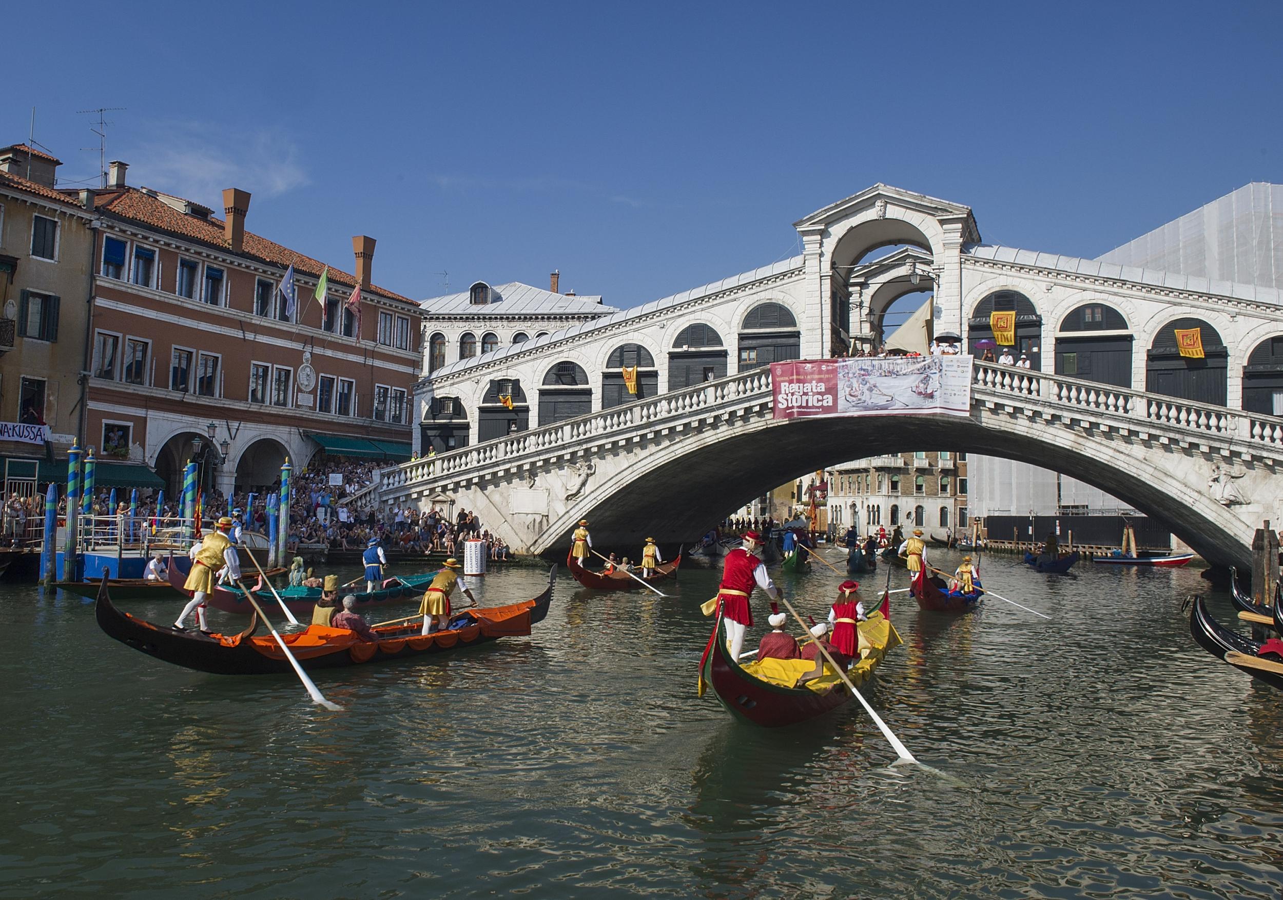 The Rialto Bridge is one of Venice's main tourist sites, as well as the location for events such as the Regatta Storica
