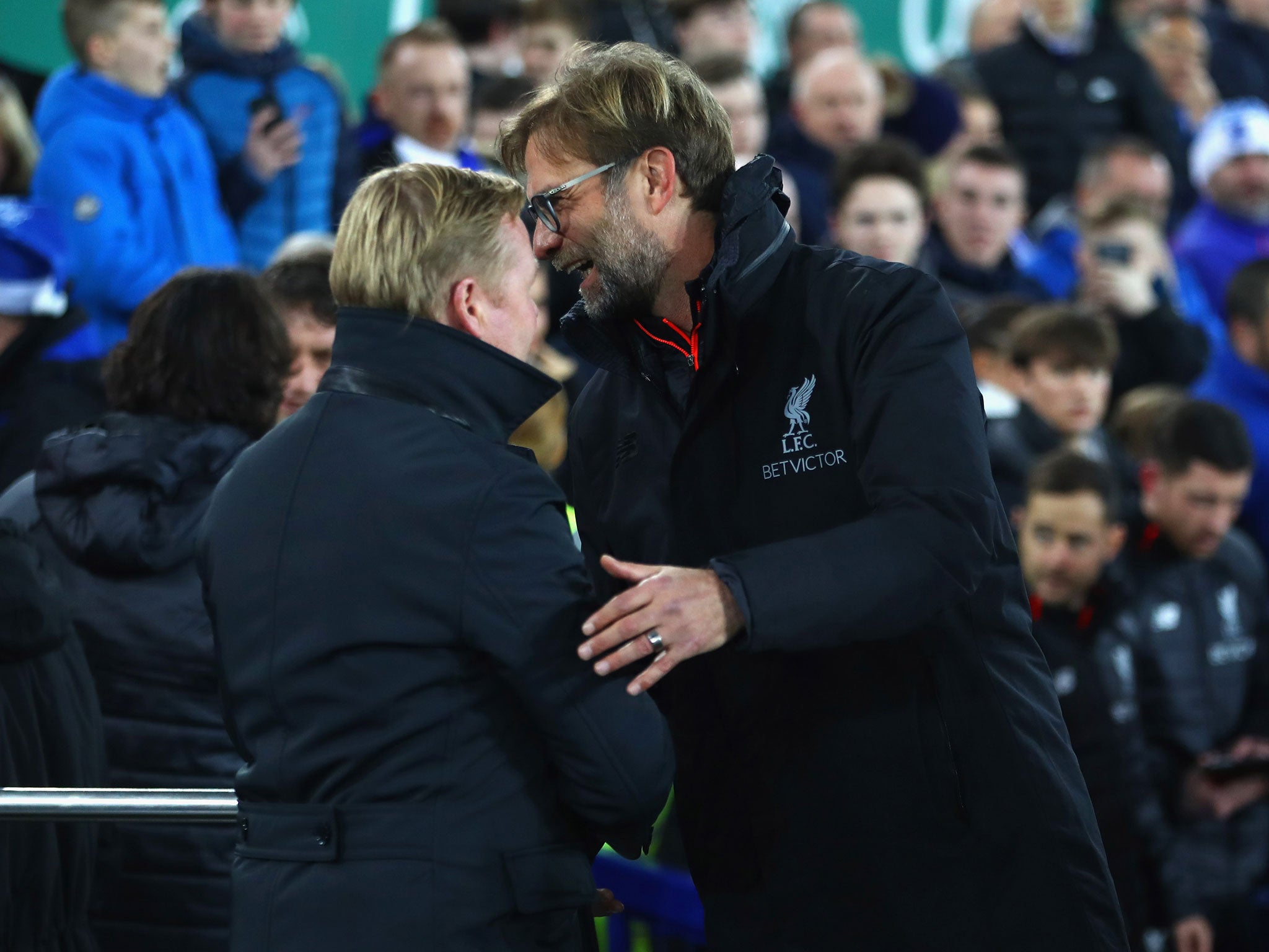 Klopp and Koeman embrace during this season's first Merseyside derby at Goodison Park