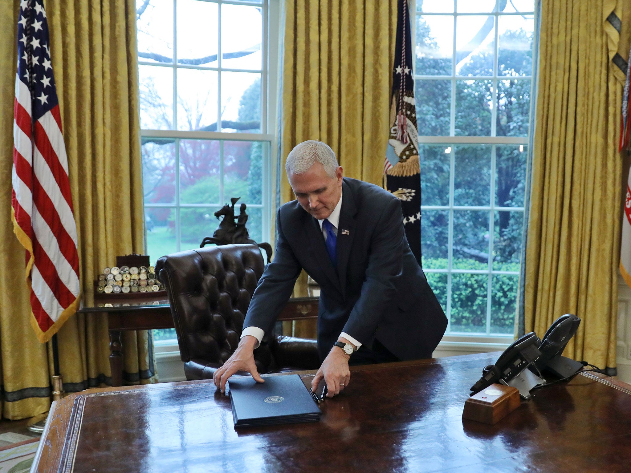 Vice President Mike Pence was left to collect the executive orders Donald Trump had been due to sign on 31 March