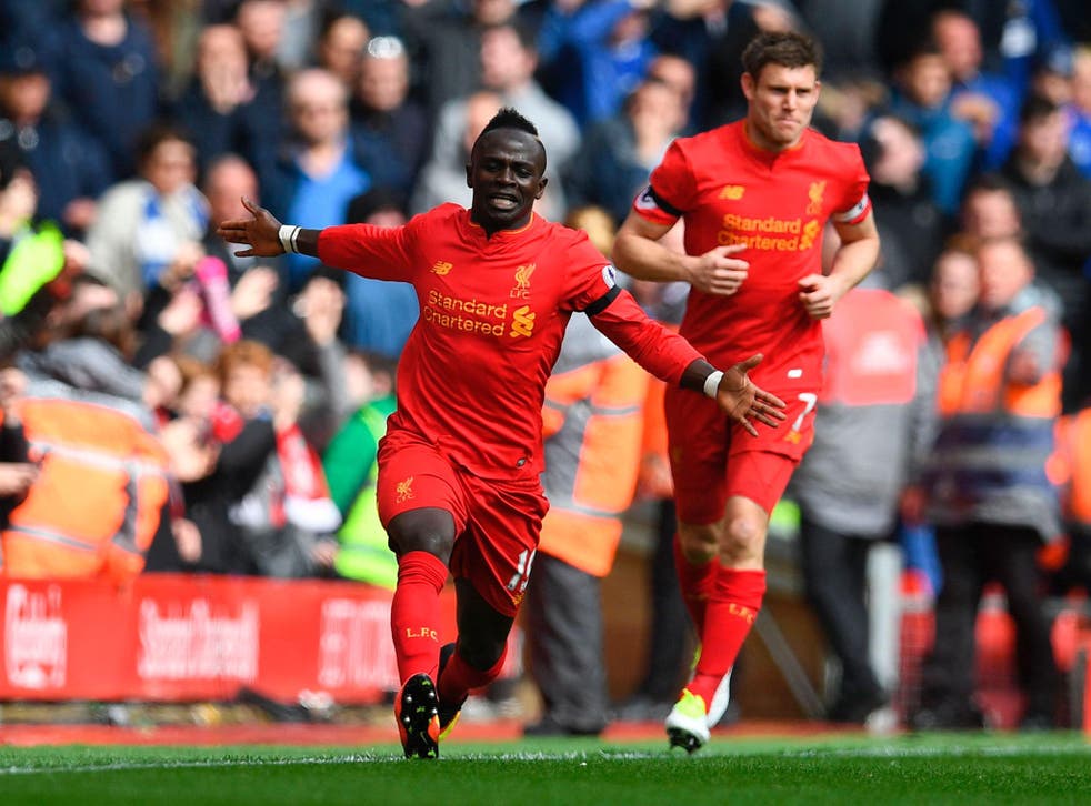 Sadio Mane celebrates scoring the opening goal for Liverpool