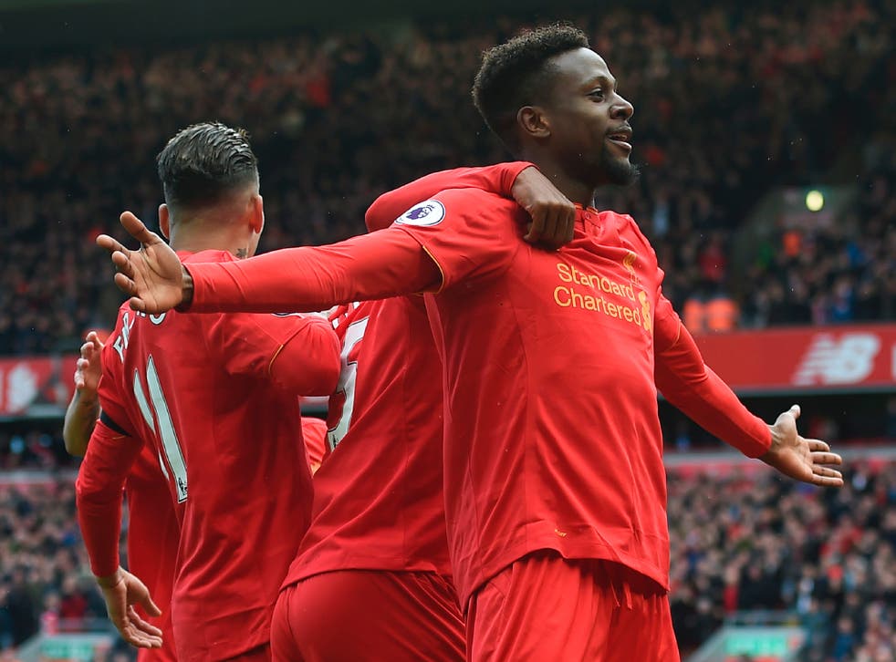 Divock Origi celebrates scoring Liverpool's third goal of the afternoon