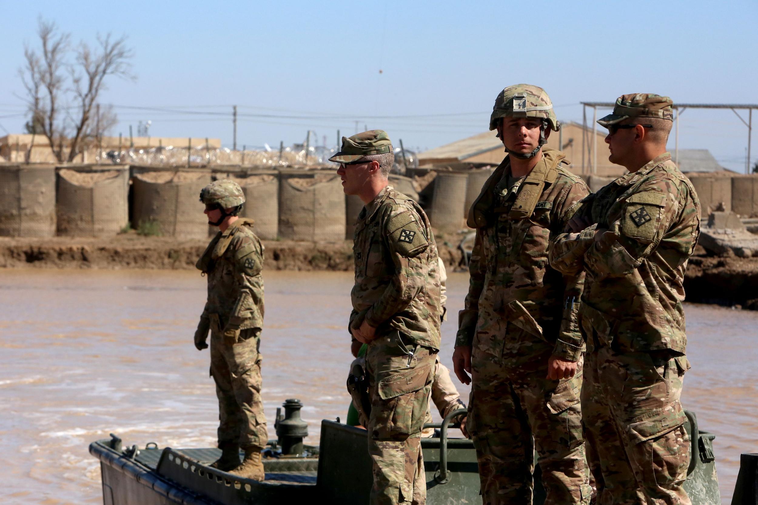 US army forces supervise a training session for Iraqi soldiers in Baghdad