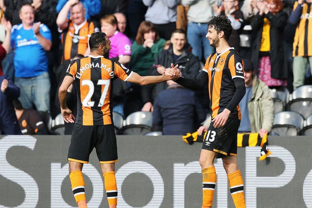 Andrea Ranocchia celebrates scoring his side's second goal with Ahmed Elmohamady